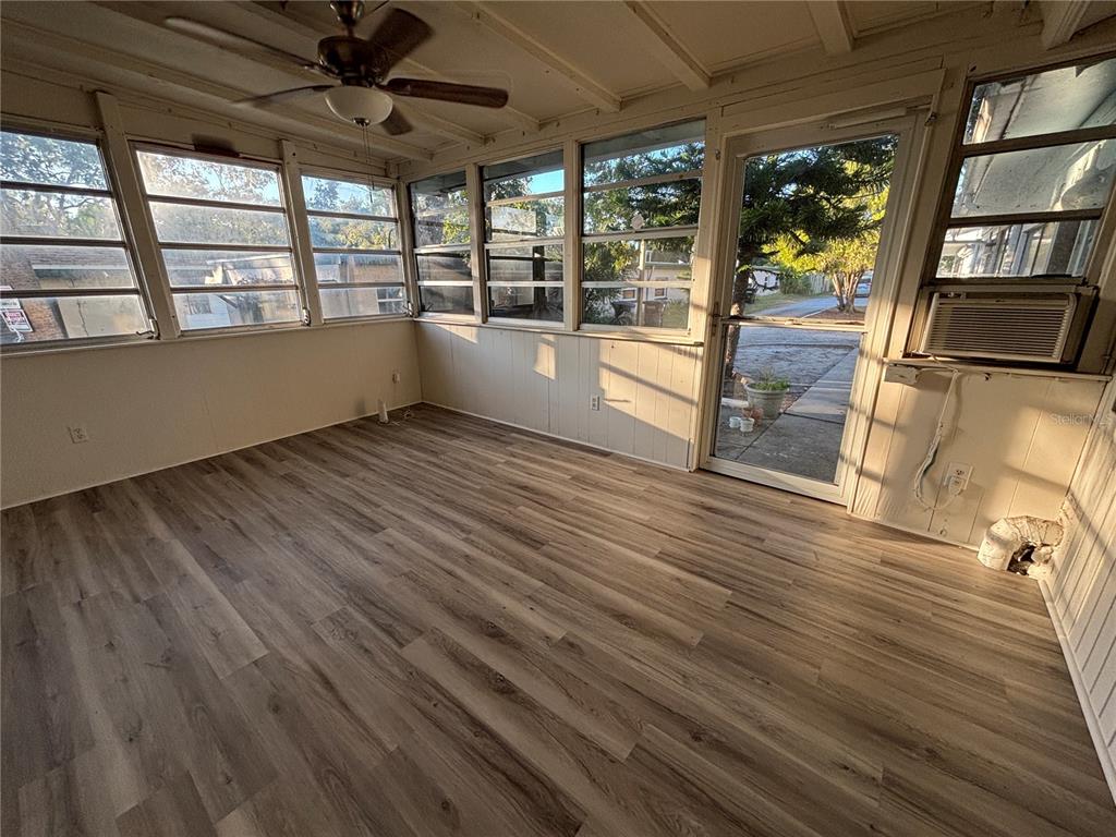 1102 Sunset Point Road, Unit 6 Clearwater, FL 33755 - Photo 30 of 31 a view of an empty room with a window