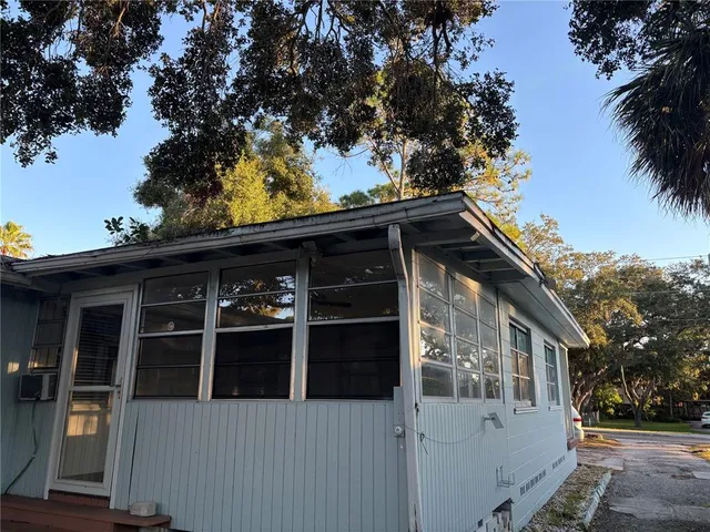 a view of a house with a large window