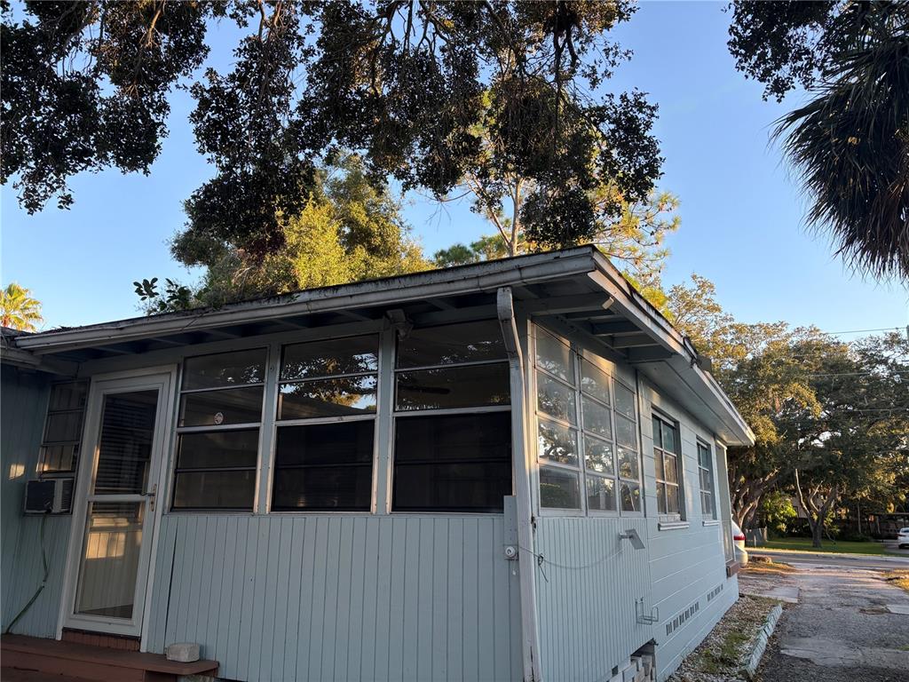 1102 Sunset Point Road, Unit 6 Clearwater, FL 33755 - Photo 31 of 31 a view of a house with a large window
