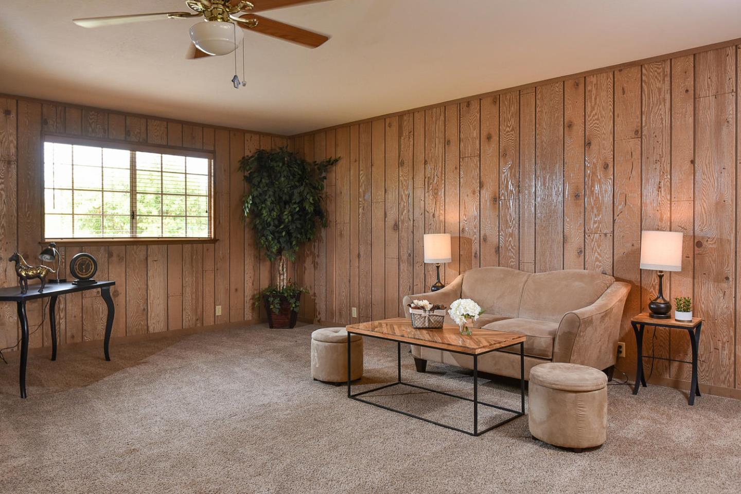 9235 Burchell Road Gilroy, CA 95020 - Photo 16 of 29 a living room with furniture and a window