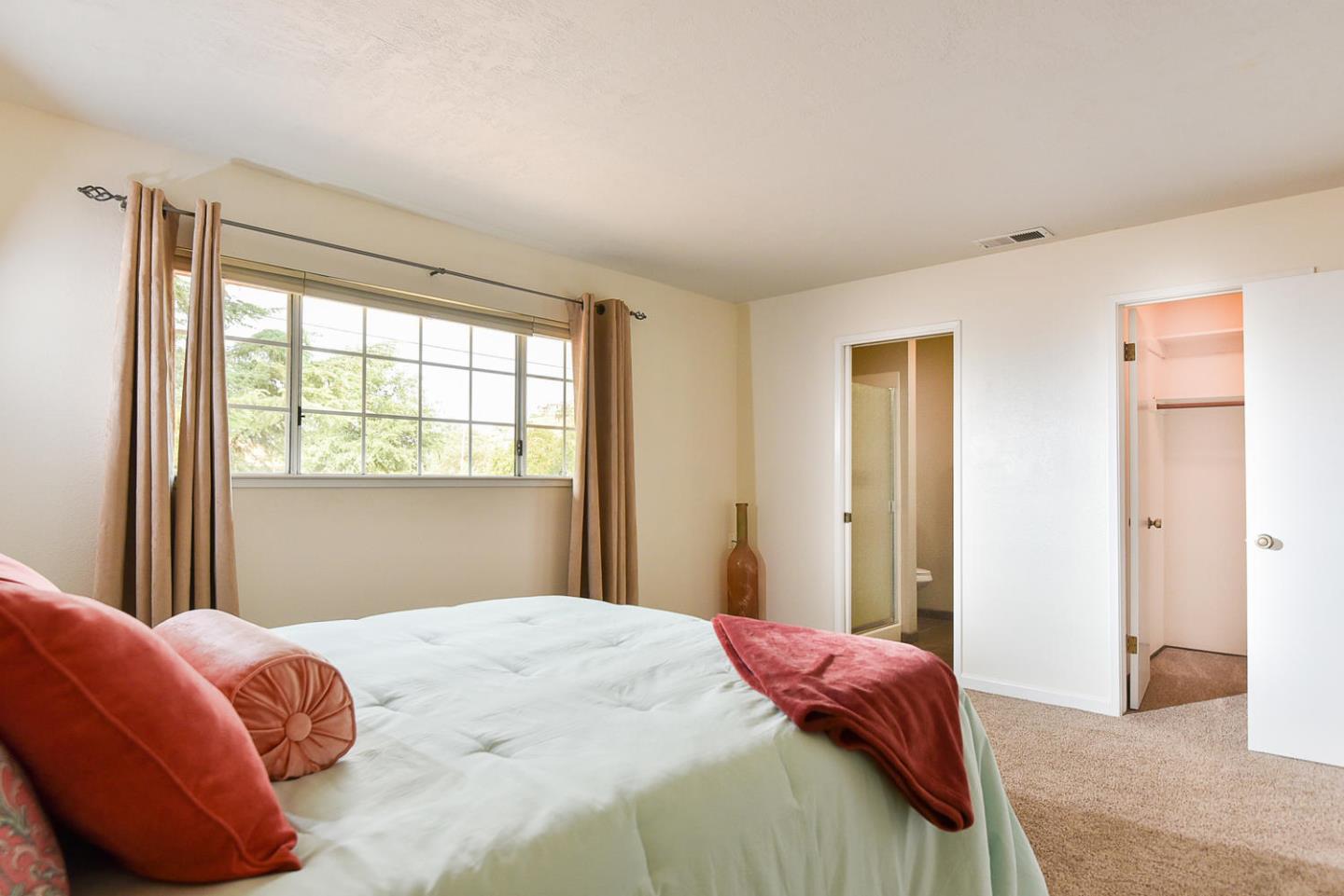 9235 Burchell Road Gilroy, CA 95020 - Photo 24 of 29 a bedroom with a bed and a window
