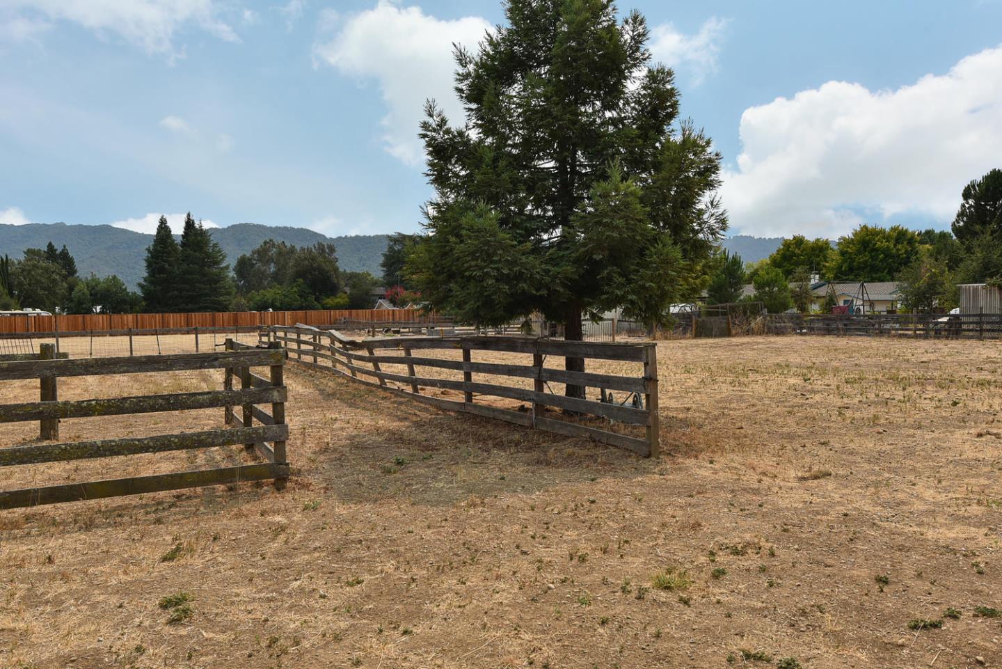 9235 Burchell Road Gilroy, CA 95020 - Photo 4 of 29 a view of street with wooden fence