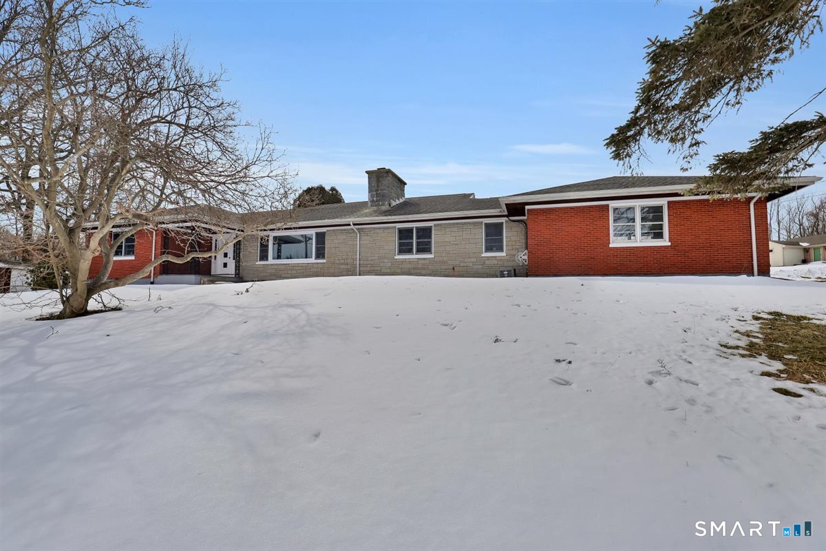 a view of a house with a park