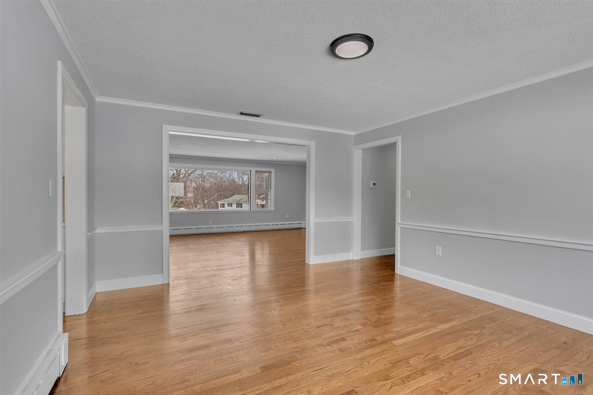 909 Randolph Road Middletown, CT 06457 - Photo 8 of 24 a view of a room with wooden floor