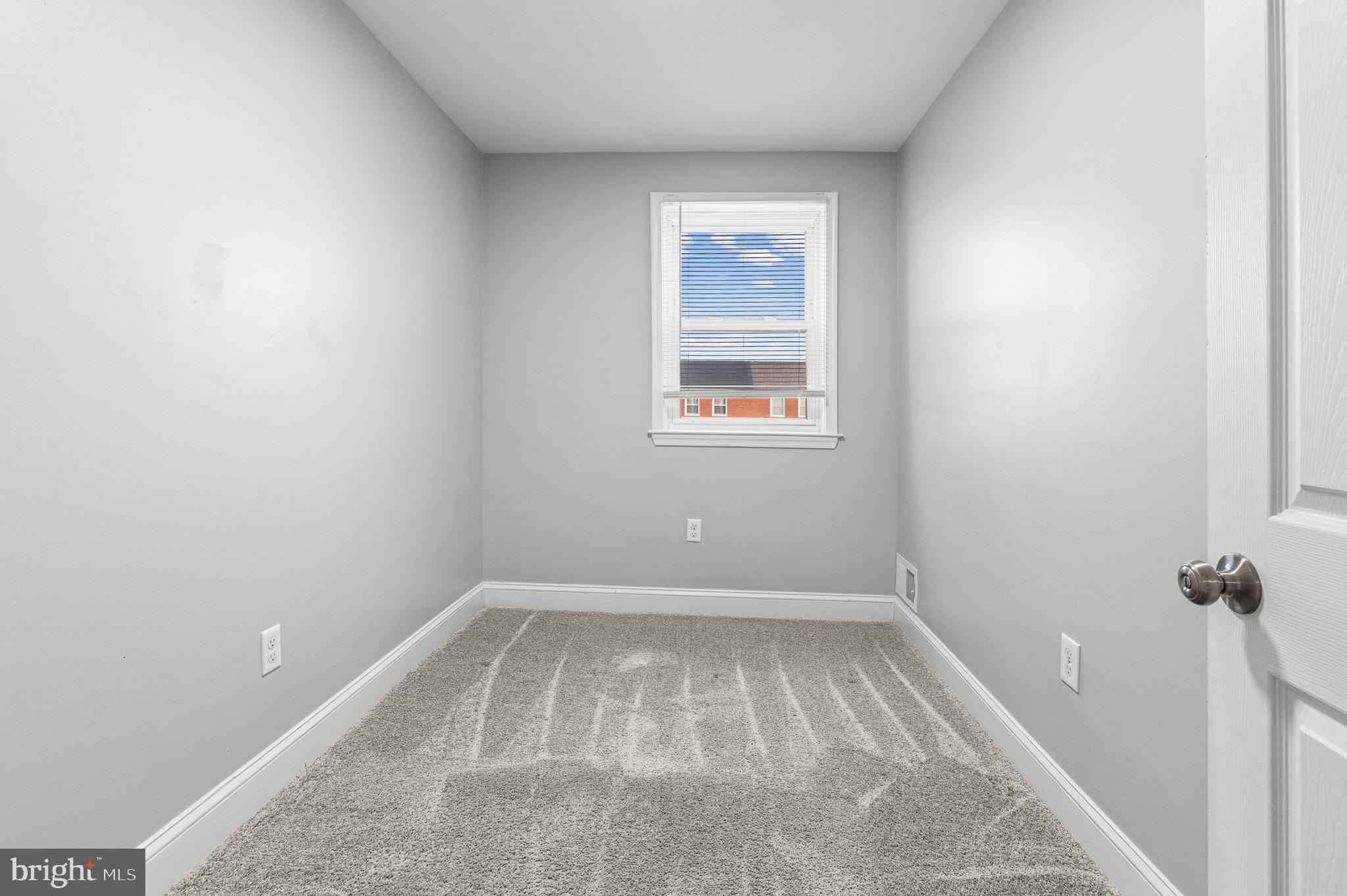 2203 Redthorn Road Baltimore, MD 21220 - Photo 13 of 23 an empty room with a window
