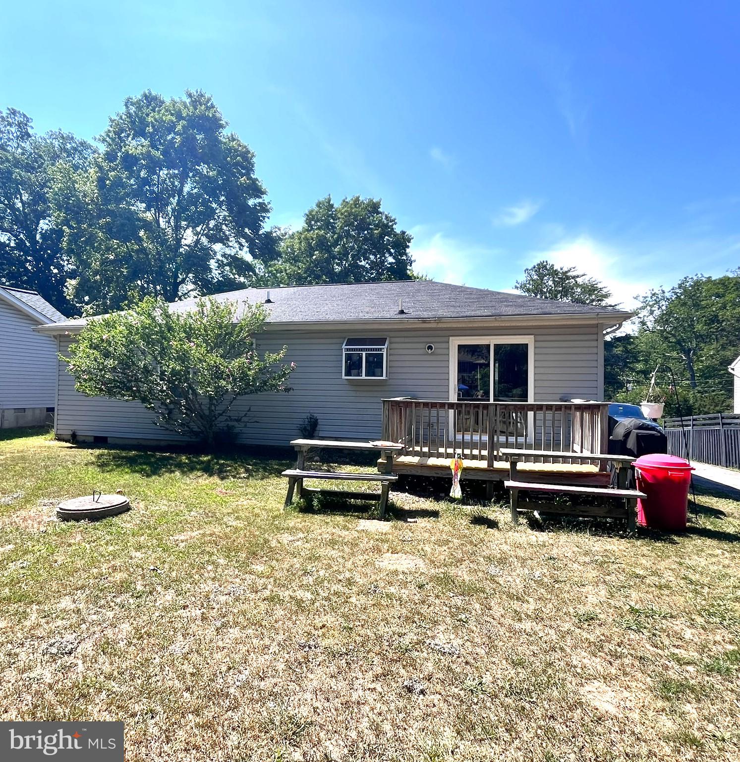 12566 Santa Rosa Road Lusby, MD 20657 - Photo 2 of 6 a view of a house with a backyard and sitting area
