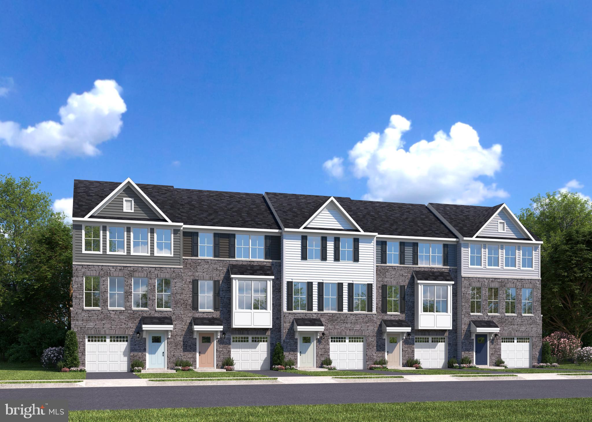 93 C Destrier Street Ranson, WV 25438 - Photo 17 of 17 a front view of a house with a yard