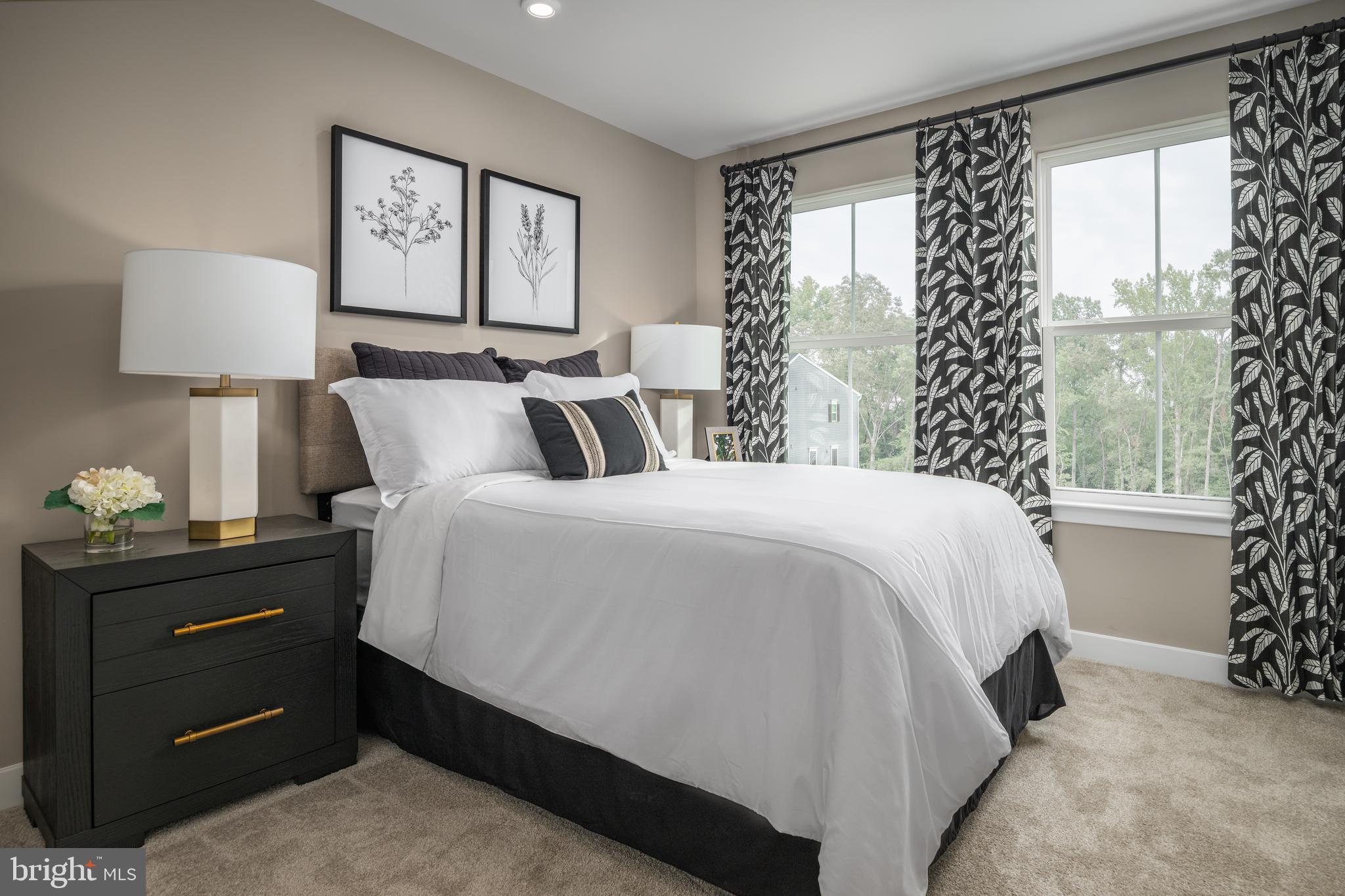 93 C Destrier Street Ranson, WV 25438 - Photo 10 of 17 a spacious bedroom with a bed and a window