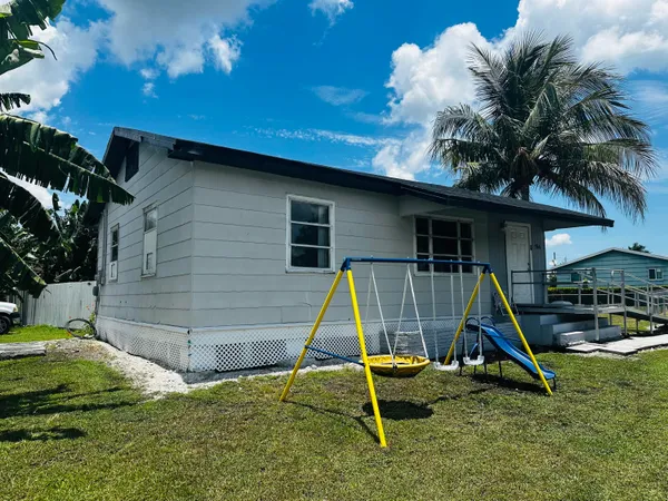 $295,000 | 566 Southeast 7th Drive, Belle Glade, FL 33430