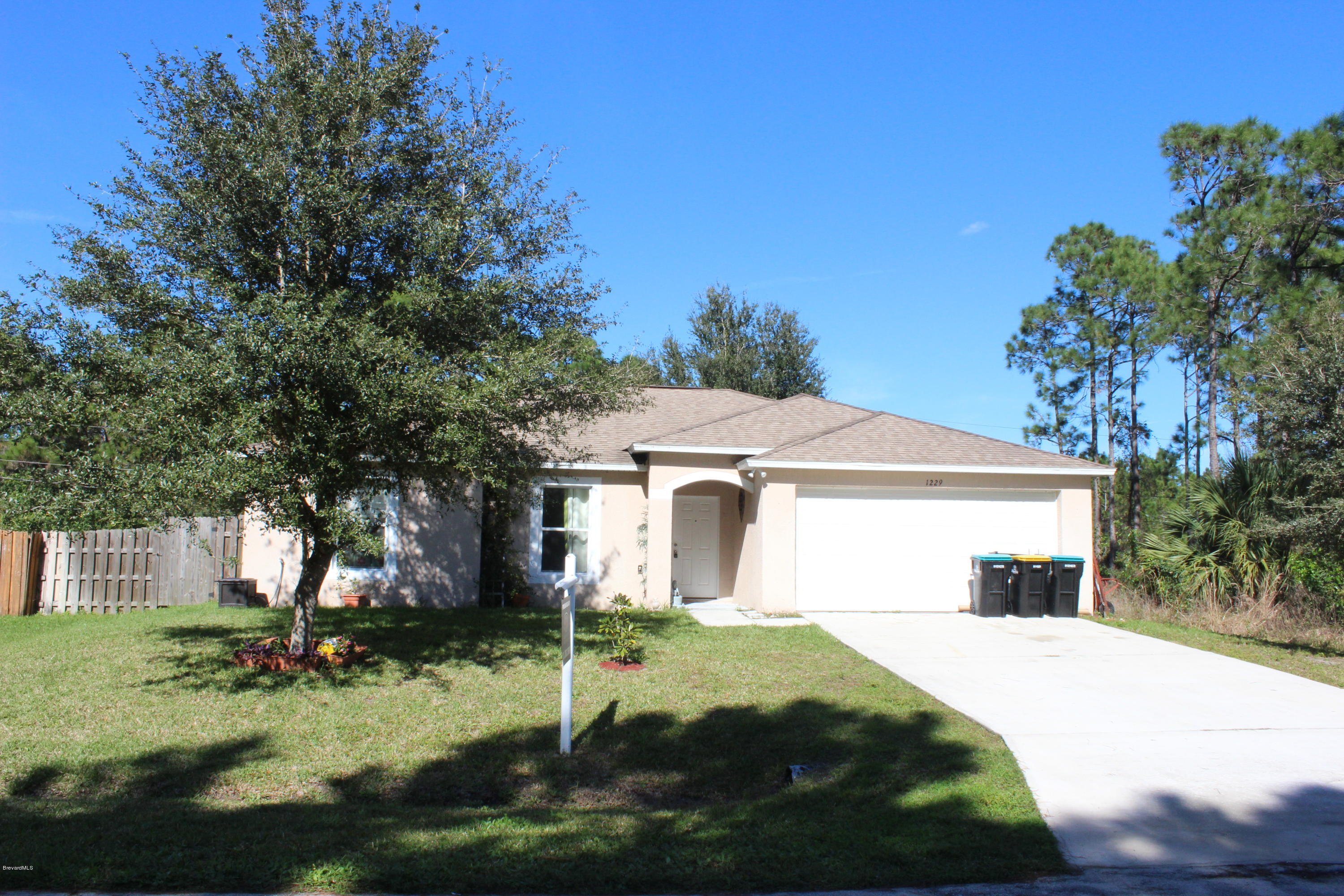 1229 Gerrity Street Southwest Palm Bay, FL 32908 - Photo 1 of 28 1