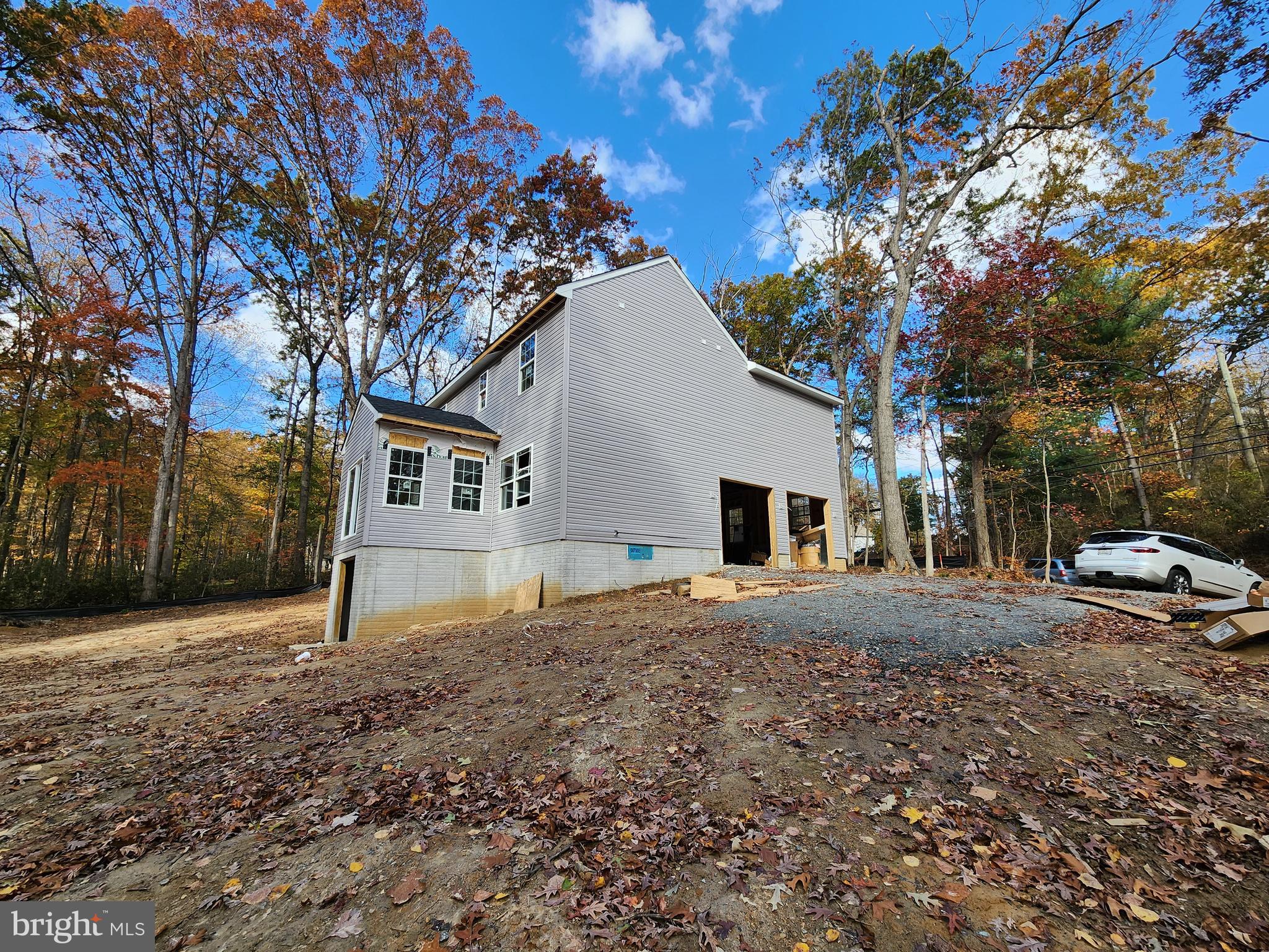1132 Nottingham Road Elkton, MD 21921 - Photo 18 of 18 a house with trees in front of it