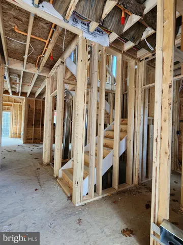a view of a room with wooden walls