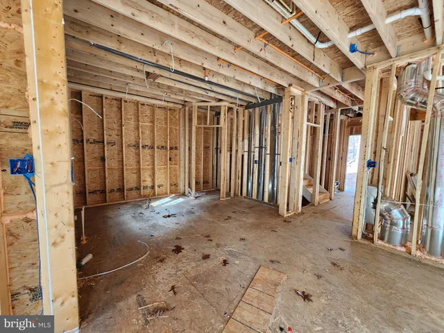 a view of a hallway with staircase