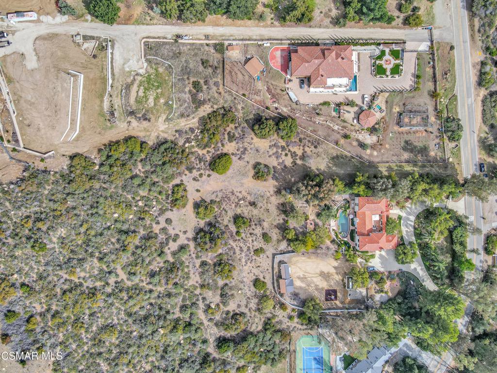 2140 Stunt Road Calabasas, CA 91302 - Photo 12 of 13 an aerial view of a house with a yard