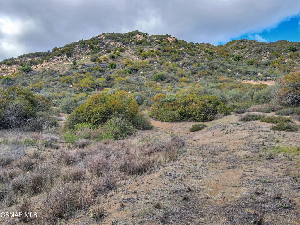 2140 Stunt Road Calabasas, CA 91302 - Photo 5 of 13 a view of a large building with mountains in the background