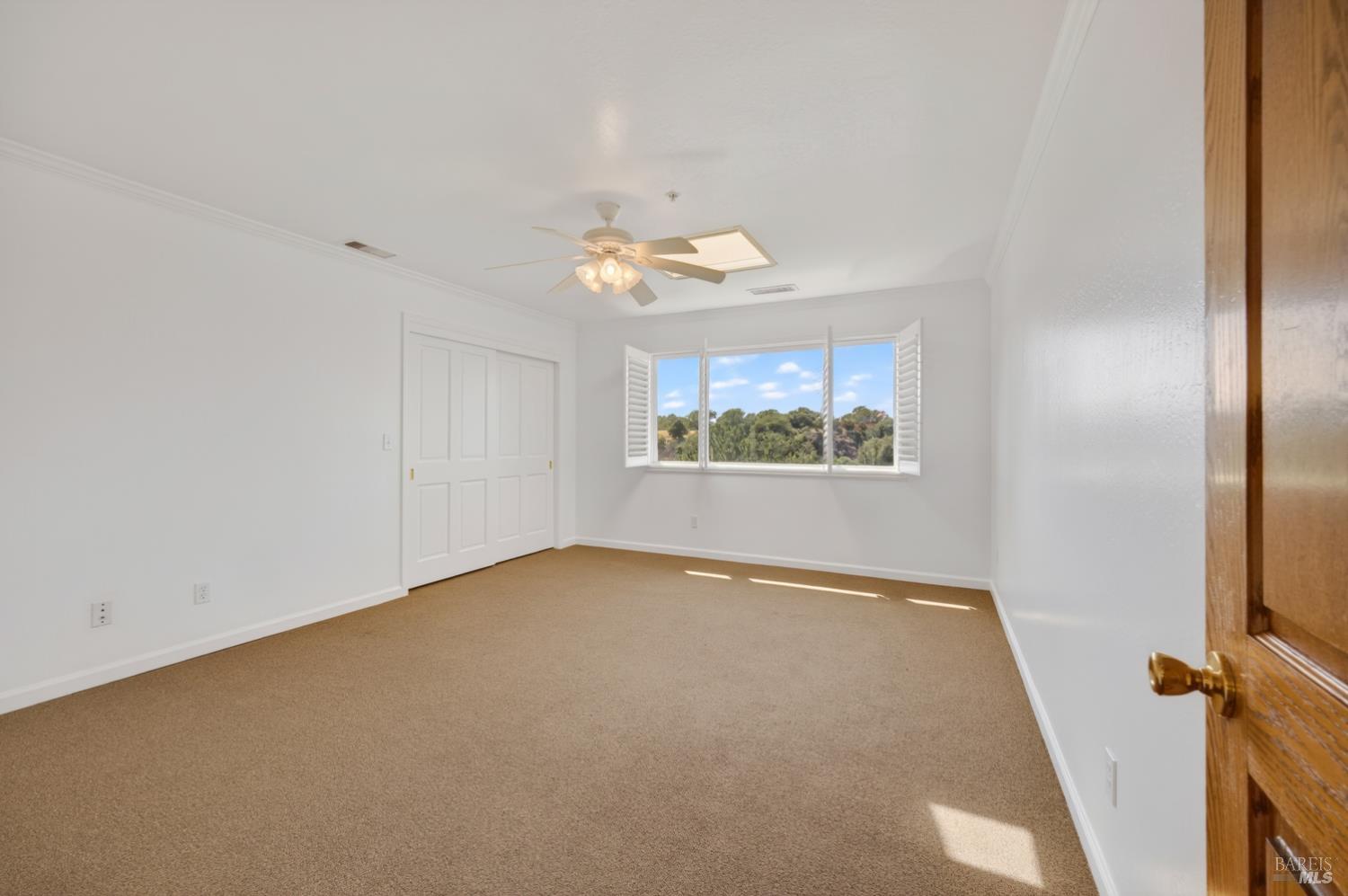 10 Lockton Lane Novato, CA 94945 - Photo 35 of 68 Additional upper-level bedroom with good scale, natural light, and flexible use for family, guests, or office needs.