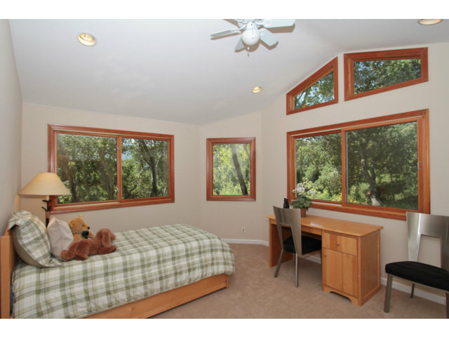 188 Alta Mesa Road Woodside, CA 94062 - Photo 12 of 25 a bedroom with a bed and a large window