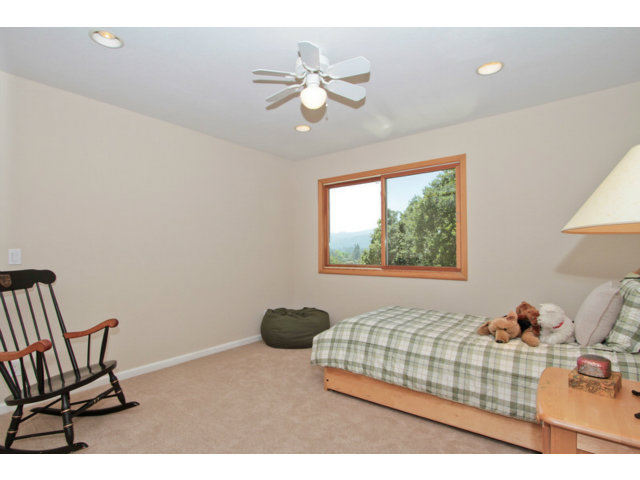 188 Alta Mesa Road Woodside, CA 94062 - Photo 13 of 25 a bedroom with a bed and window