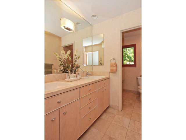 188 Alta Mesa Road Woodside, CA 94062 - Photo 15 of 25 a bathroom with a double vanity sink and a mirror