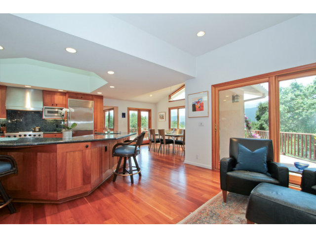 188 Alta Mesa Road Woodside, CA 94062 - Photo 6 of 25 a living room with furniture a wooden floor and a large window