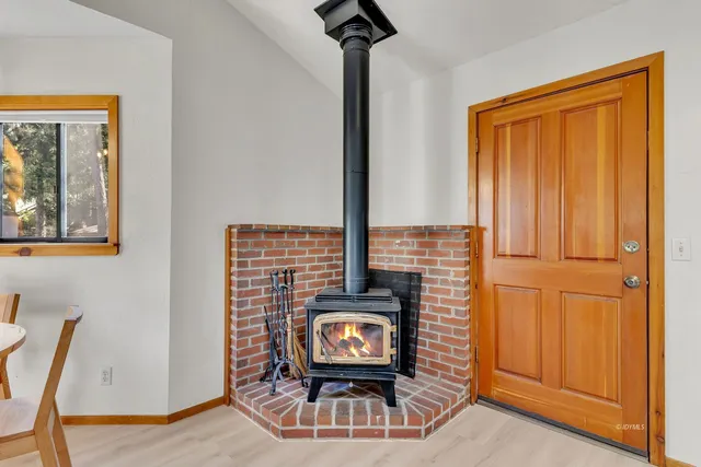 a view of a livingroom with furniture and a flat screen tv