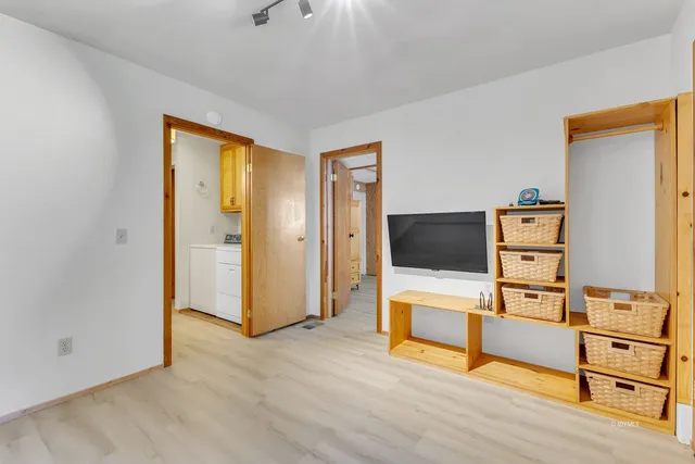 a view of outdoor space with deck and tree