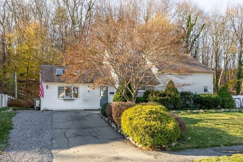 48 Porter Road Natick, MA 01760 - Photo 3 of 18 a front view of a house with a yard