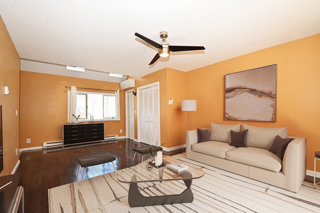 48 Porter Road Natick, MA 01760 - Photo 9 of 18 a living room with furniture and wooden floor