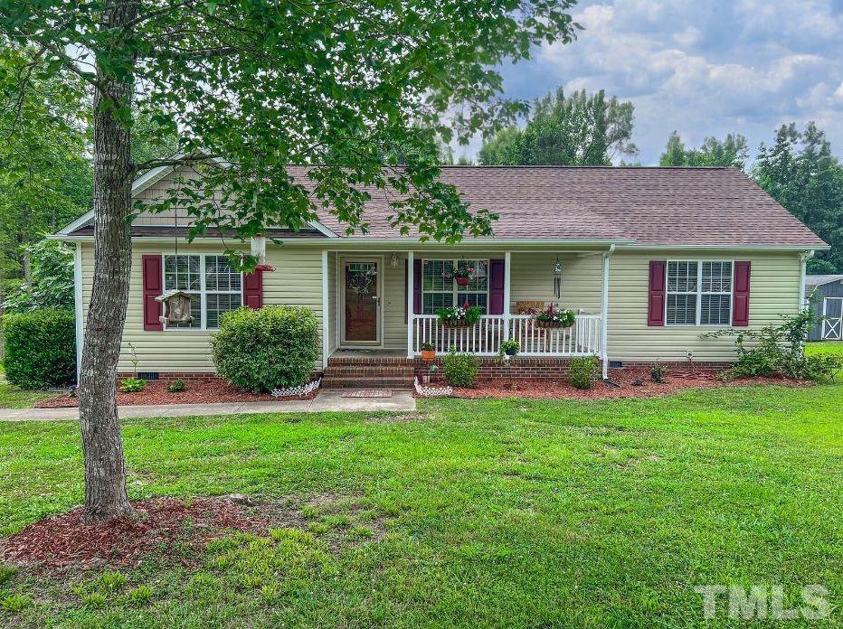 159 Punch Hill Farm Road Rougemont, NC 27572 - Photo 18 of 43 a front view of house with yard and green space