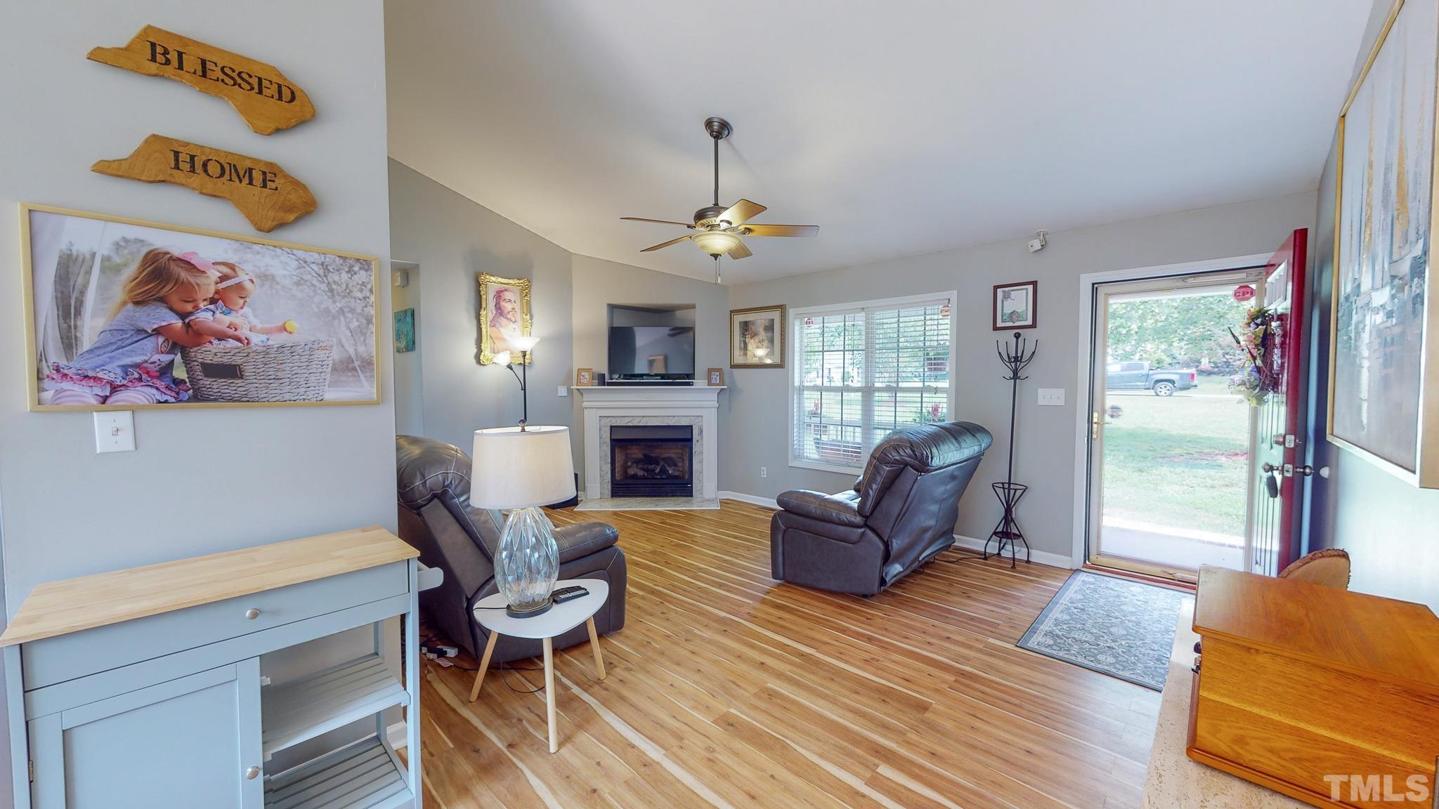 159 Punch Hill Farm Road Rougemont, NC 27572 - Photo 21 of 43 a view of a livingroom with furniture a ceiling fan and window