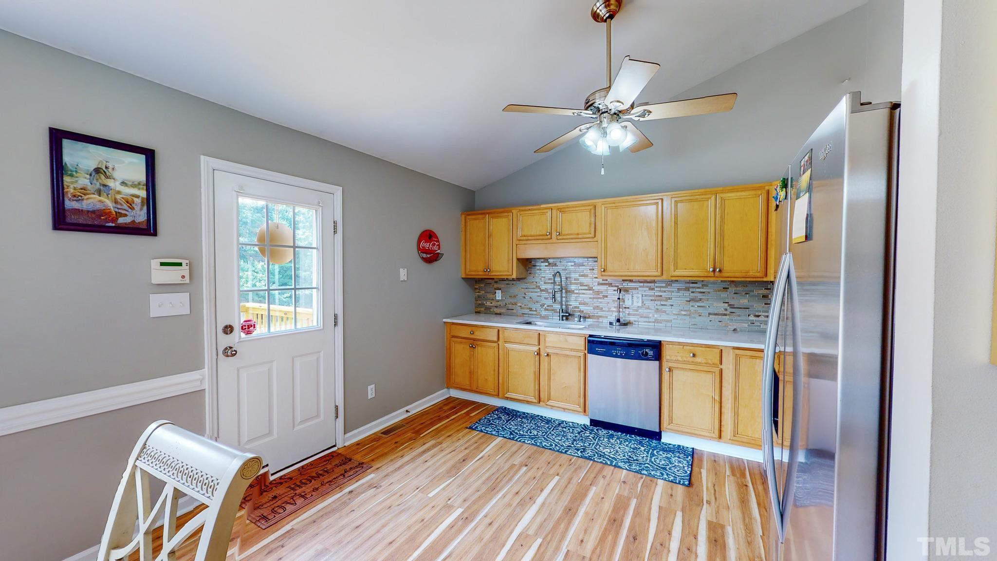 159 Punch Hill Farm Road Rougemont, NC 27572 - Photo 23 of 43 a kitchen with stainless steel appliances granite countertop a stove and a sink