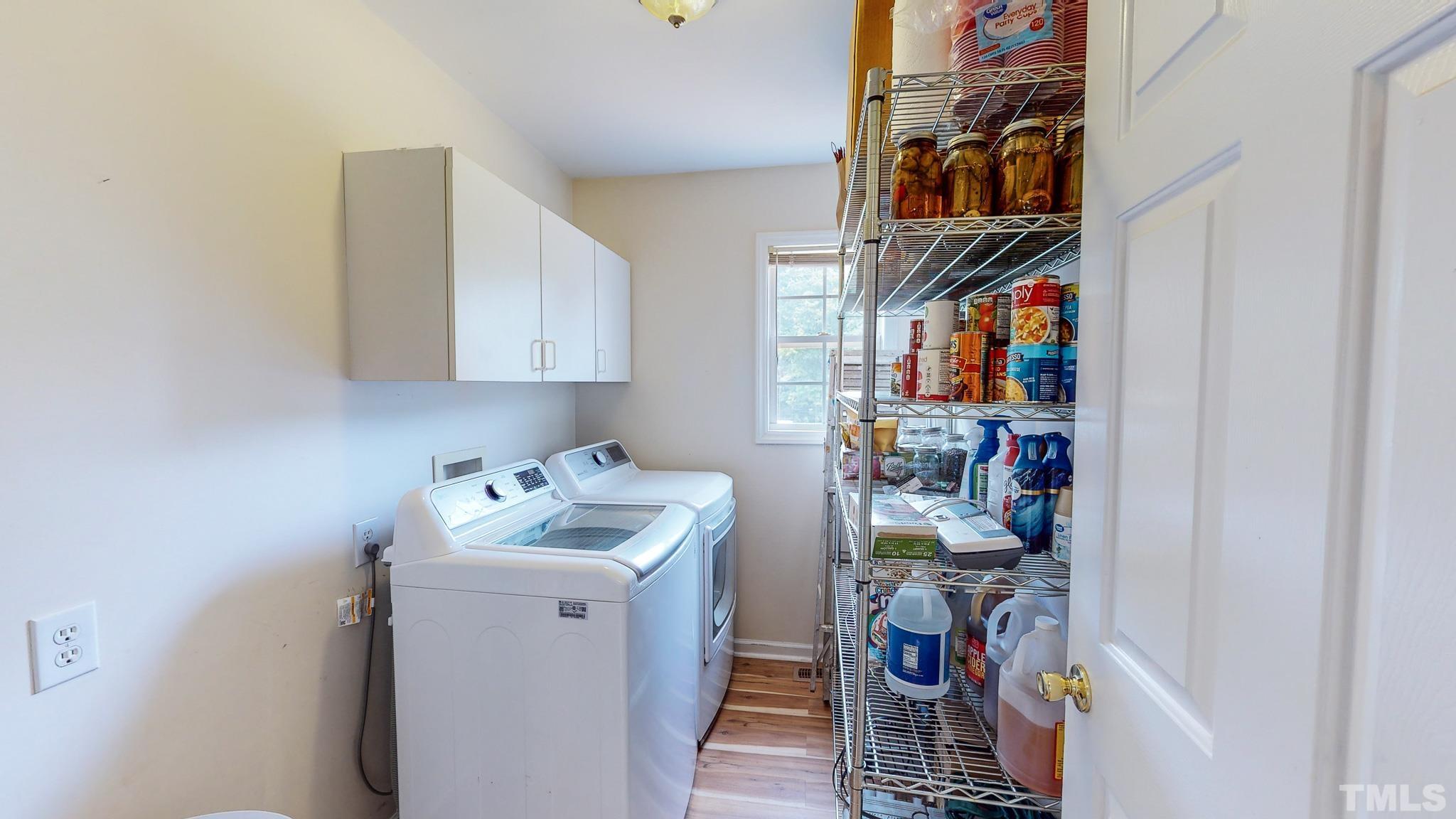 159 Punch Hill Farm Road Rougemont, NC 27572 - Photo 29 of 43 a storage room with washer and dryer