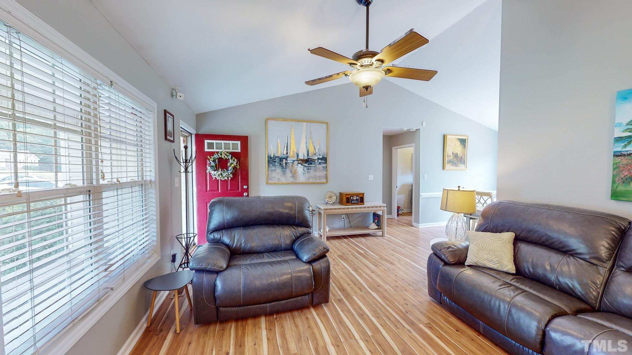 159 Punch Hill Farm Road Rougemont, NC 27572 - Photo 33 of 43 a living room with furniture and a wooden floor