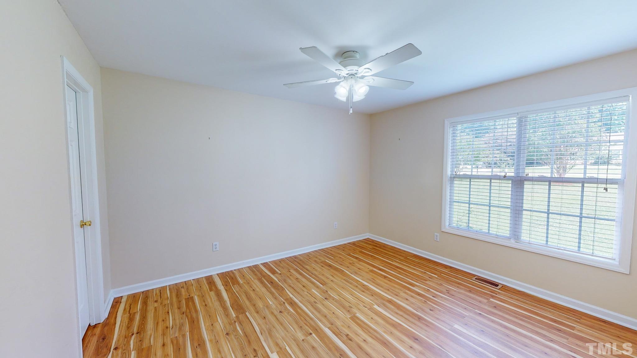 159 Punch Hill Farm Road Rougemont, NC 27572 - Photo 35 of 43 a view of a room with wooden floor and windows