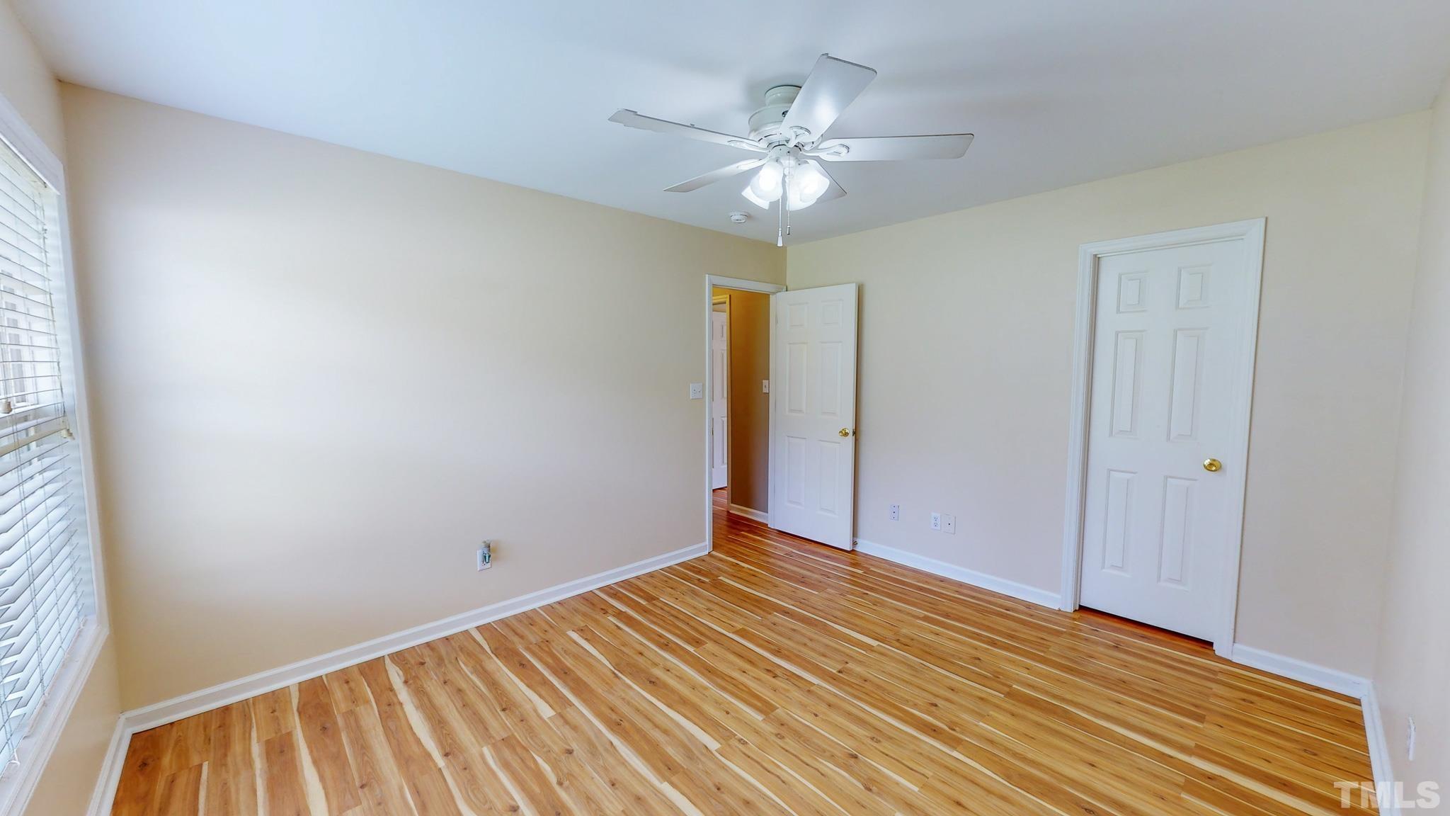159 Punch Hill Farm Road Rougemont, NC 27572 - Photo 36 of 43 a view of an empty room with wooden floor