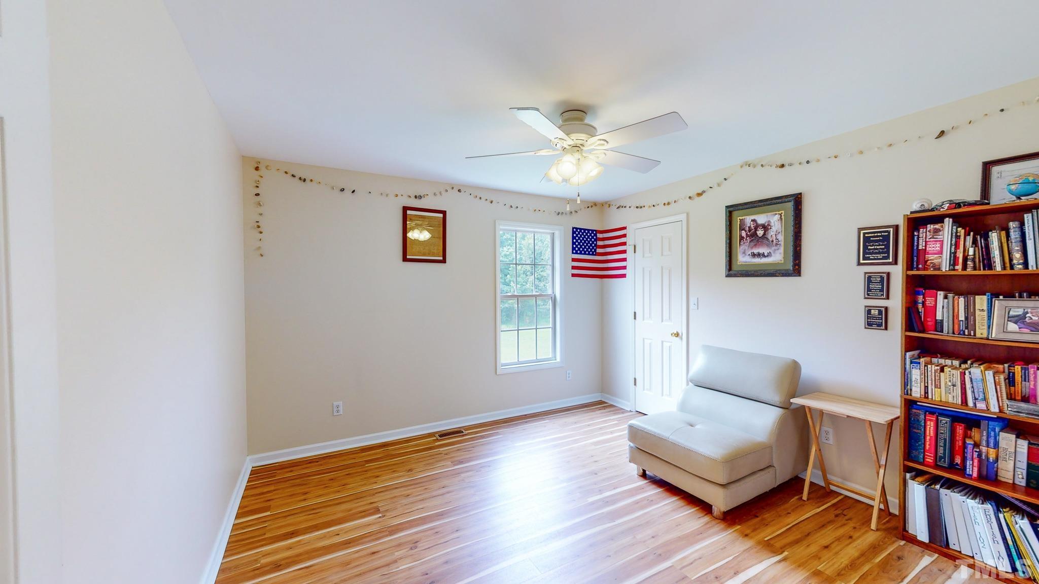 159 Punch Hill Farm Road Rougemont, NC 27572 - Photo 37 of 43 a view of a livingroom with furniture and book shelf