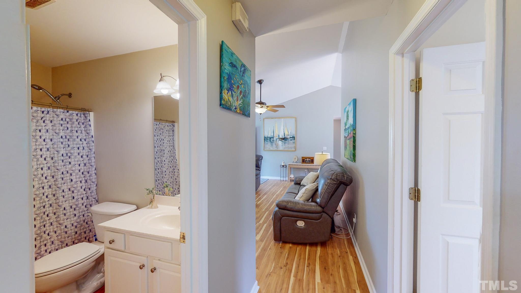 159 Punch Hill Farm Road Rougemont, NC 27572 - Photo 41 of 43 a living room with furniture and a toilet