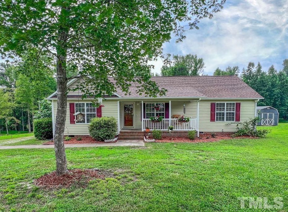 159 Punch Hill Farm Road Rougemont, NC 27572 - Photo 43 of 43 a front view of house with yard and green space