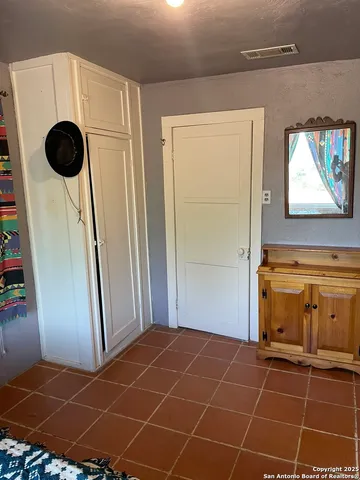 a kitchen that has a sink and a stove