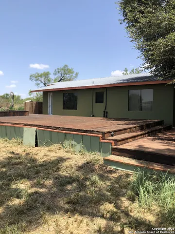 a view of swimming pool with a yard