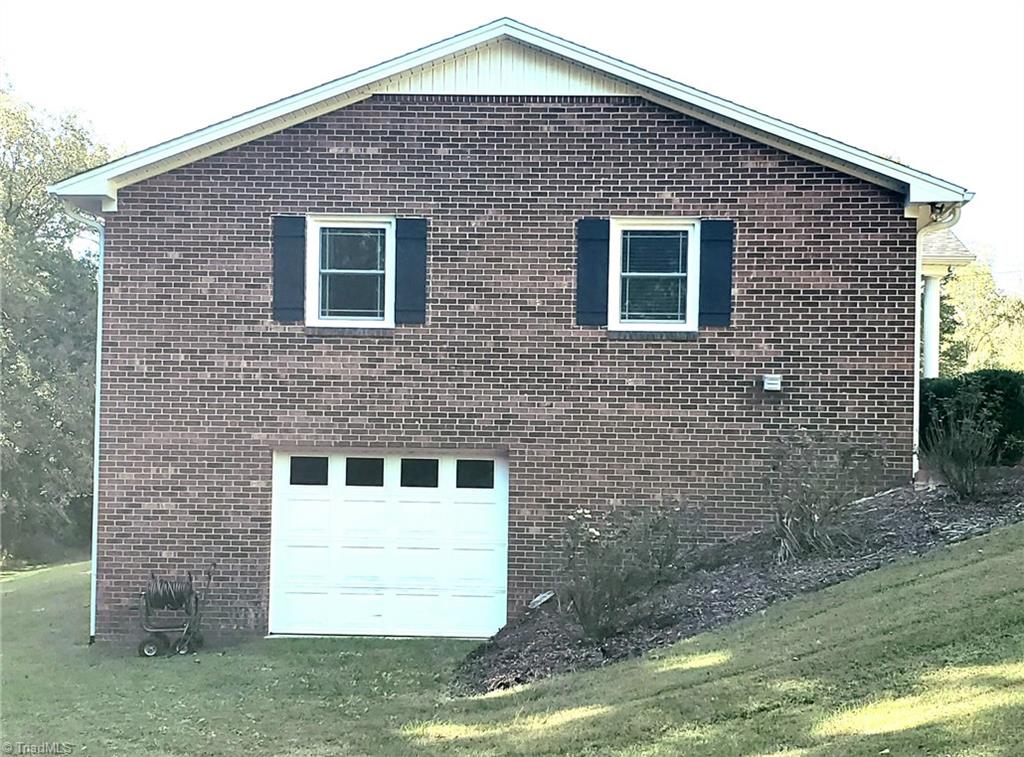 1452 Slate Road King, NC 27021 - Photo 4 of 28 Basement Garage (no driveway access)