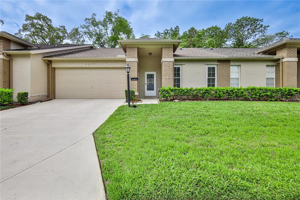 3017 Whispering Pines Court Spring Hill, FL 34606 - Photo 4 of 48