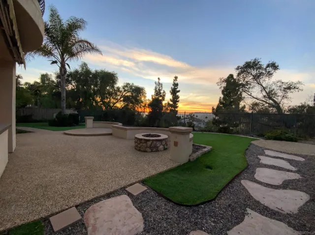 a view of balcony with outdoor space and trees