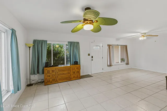 a view of an entryway with front door