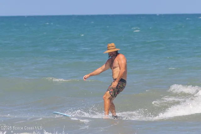 a view of wooden balcony with outdoor seating