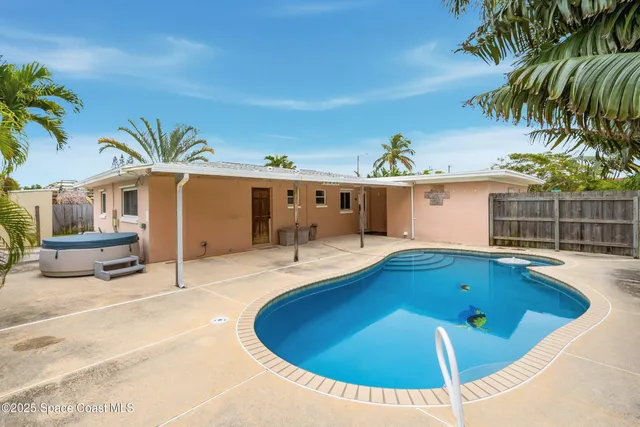 a view of outdoor space and swimming pool