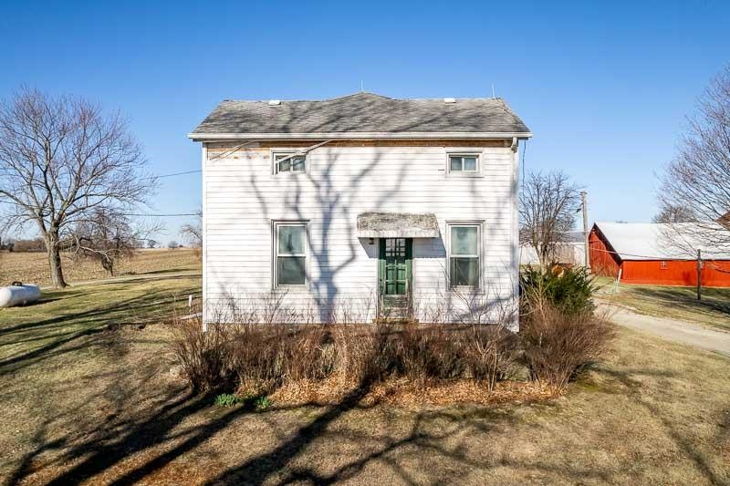 9202 Town Hall Road Belvidere, IL 61008 - Photo 11 of 39 a front view of a house with a yard