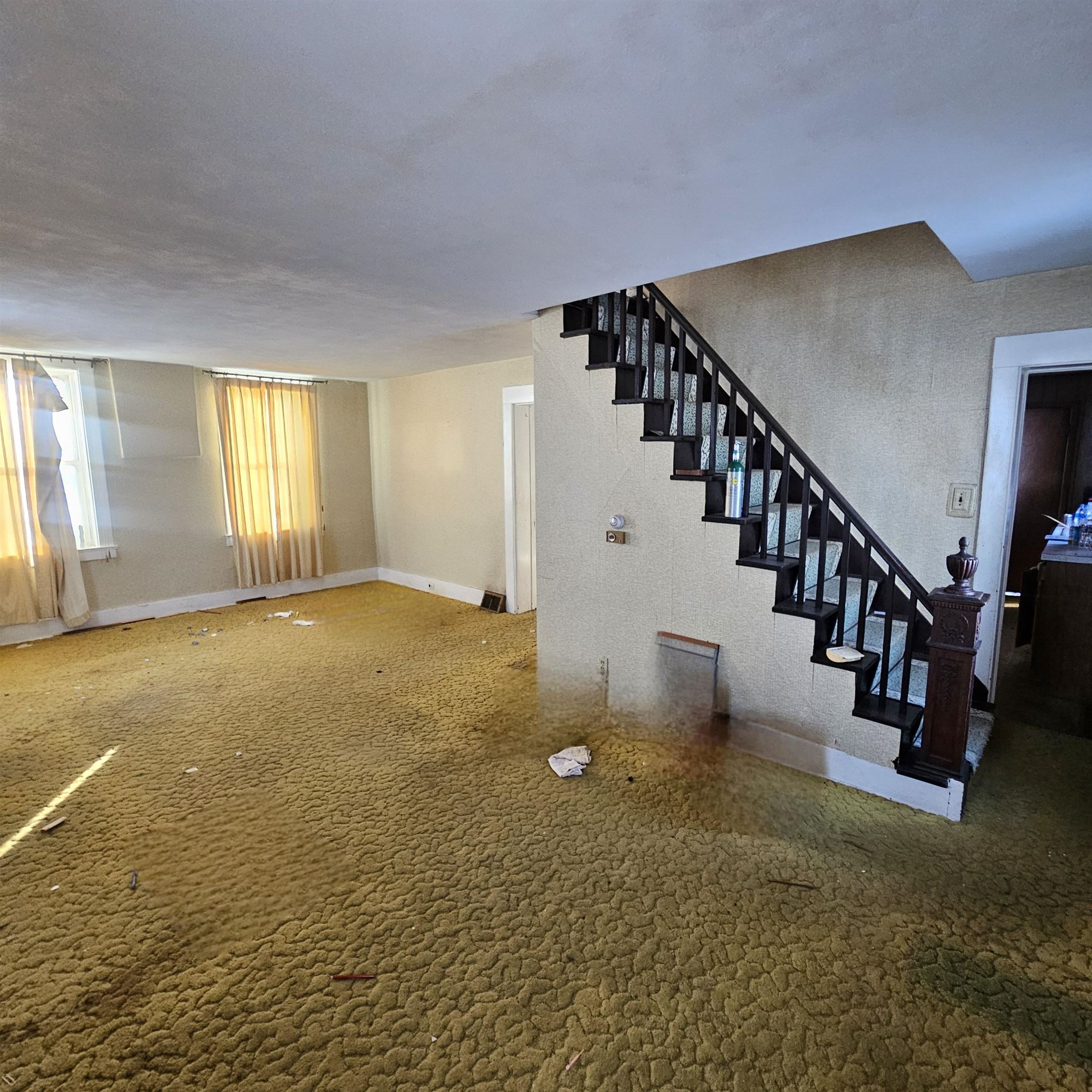 9202 Town Hall Road Belvidere, IL 61008 - Photo 35 of 39 a view of an empty room with window and stairs