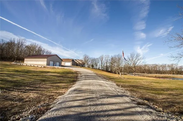 $540,000 | 2312 Southeast Rattle Snake Hill, Butler, MO 64730