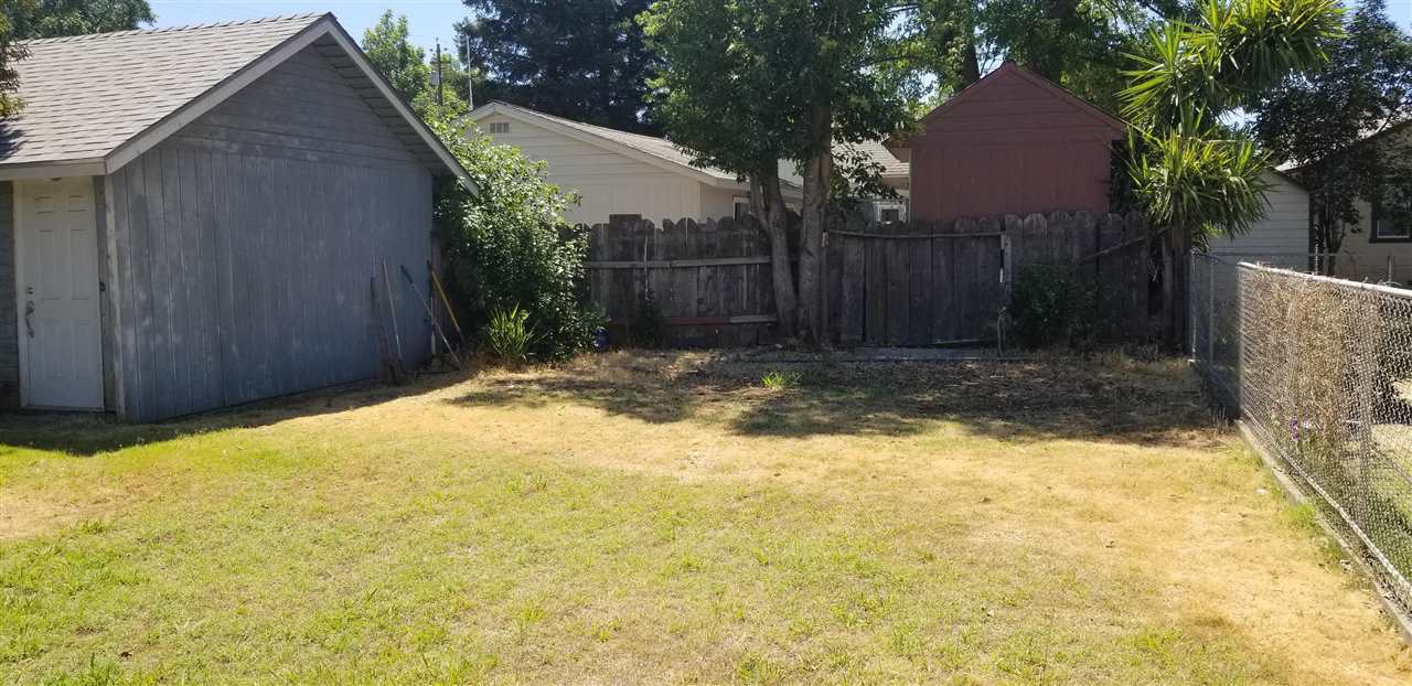 381 Aleut Street Biggs, CA 95917 - Photo 7 of 35 a view of backyard with tree